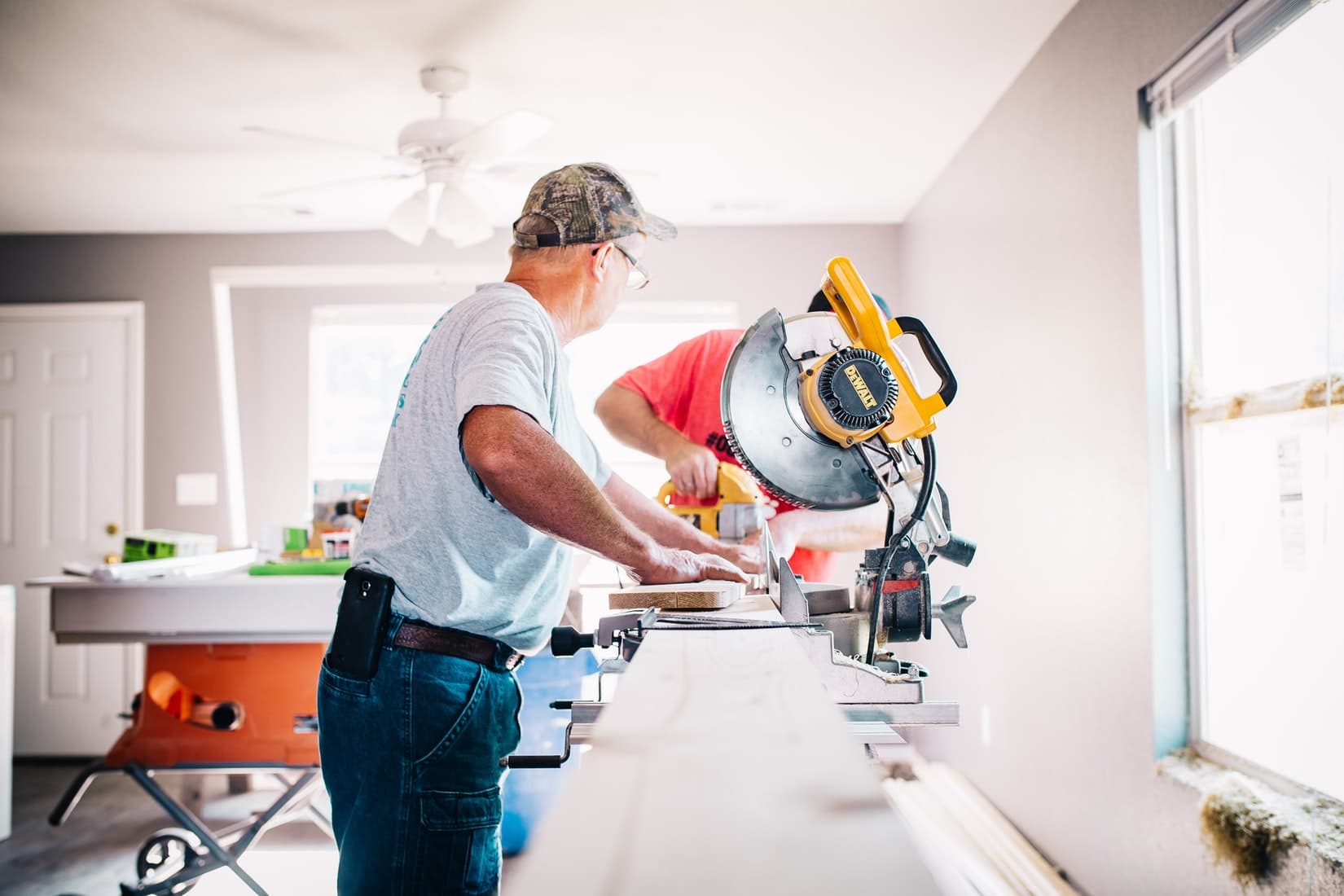 Man Sawing Wood